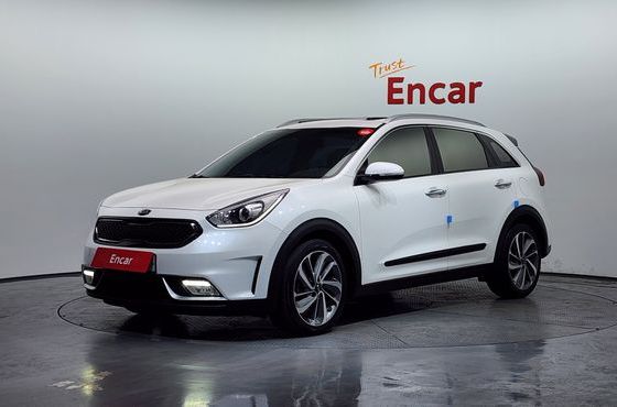 Kia Niro Prestige — пробег 124 520 км — фото 1 из 5