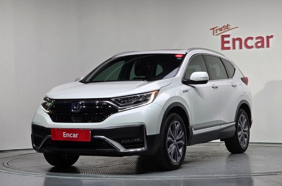 Honda CR-V 2.0 Hybrid Touring 4WD — пробег 47 959 км — фото 1 из 5