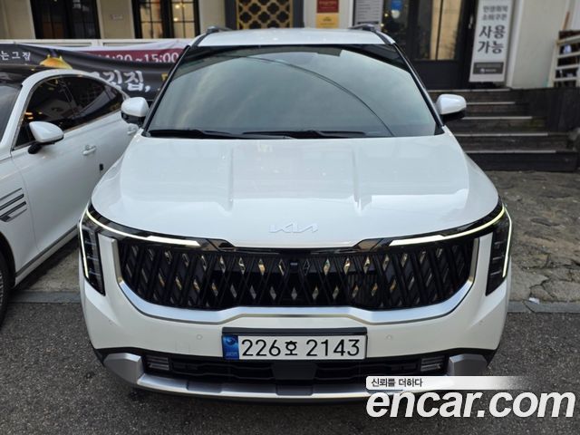 Kia Carnival HEV 9 seater Prestige — пробег 1 800 км — фото 1 из 5
