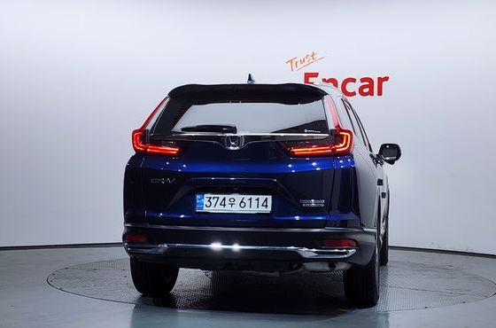 Honda CR-V 2.0 Hybrid Touring 4WD — пробег 29 112 км — фото 4 из 5