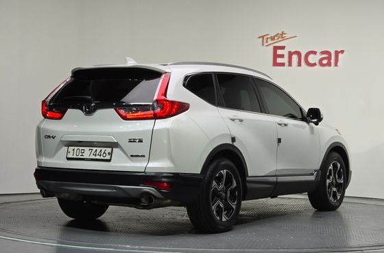 Honda CR-V 1.5 Touring 4WD — пробег 145 008 км — фото 2 из 5