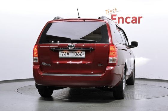 Kia Carnival Grand Carnival GLX Premium — пробег 159 116 км — фото 4 из 5
