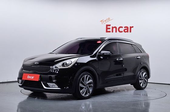 Kia Niro Prestige — пробег 105 994 км — фото 1 из 5
