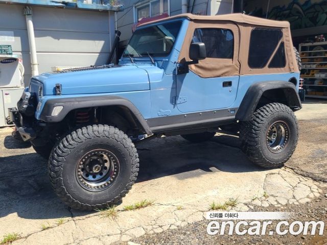 Jeep Wrangler 4.0 — пробег 170 000 км — фото 3 из 5