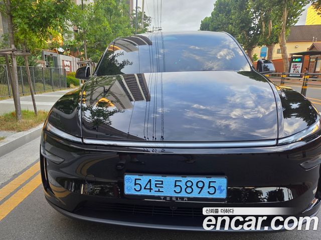 Tesla Model Y Premium RWD — пробег 1 639 км — фото 4 из 5