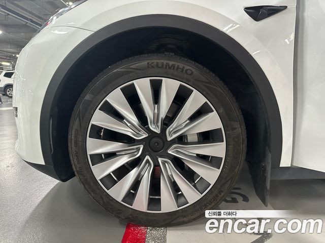 Tesla Model Y RWD — пробег 68 002 км — фото 5 из 5