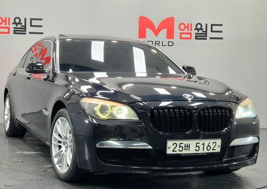 BMW 7-Series 740Li — пробег 166 253 км — фото 1 из 5