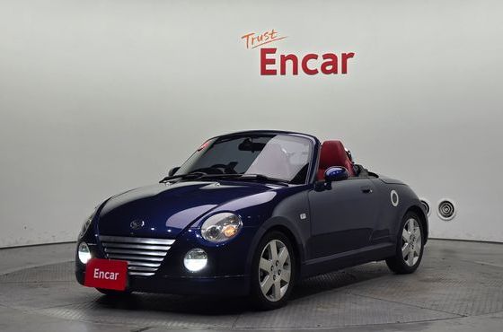 Daihatsu Copen 0.6 — пробег 150 728 км — фото 1 из 5