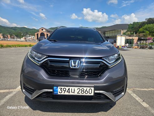 Honda CR-V 2.0 Hybrid Touring 4WD — пробег 44 600 км — фото 1 из 5