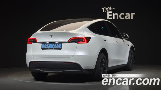 Tesla Model Y RWD — пробег 60 012 км — фото 2 из 5