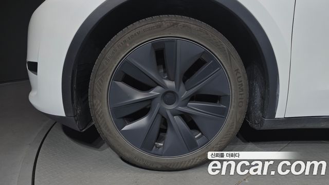 Tesla Model Y RWD — пробег 60 012 км — фото 5 из 5