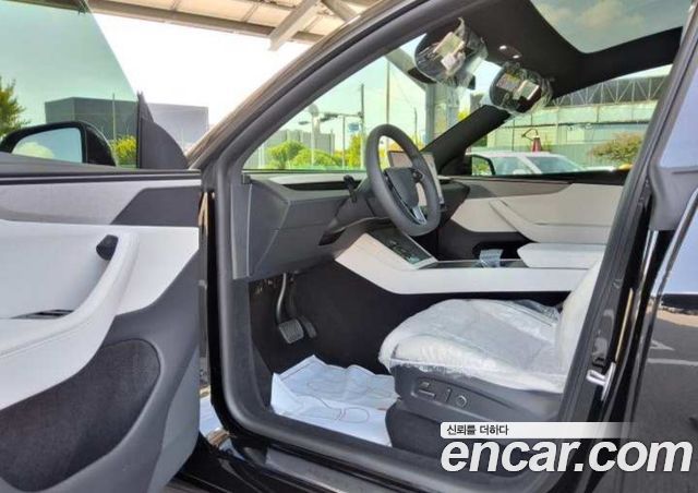 Tesla Model Y L Long Range AWD — пробег 1 км — фото 4 из 5
