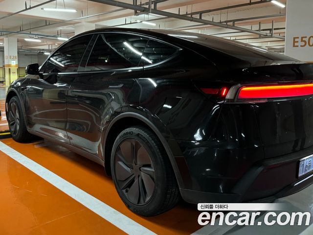 Tesla Model Y Premium RWD — пробег 2 000 км — фото 4 из 5