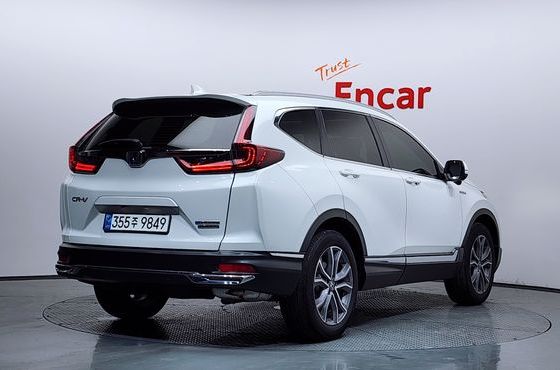 Honda CR-V 2.0 Hybrid Touring 4WD — пробег 23 113 км — фото 2 из 5