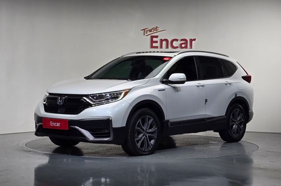 Honda CR-V 2.0 Hybrid Touring 4WD — пробег 77 334 км — фото 1 из 5