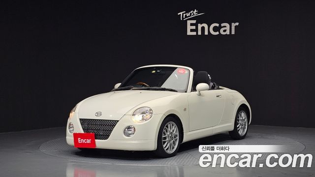 Daihatsu Copen 0.6 — пробег 95 195 км — фото 1 из 5