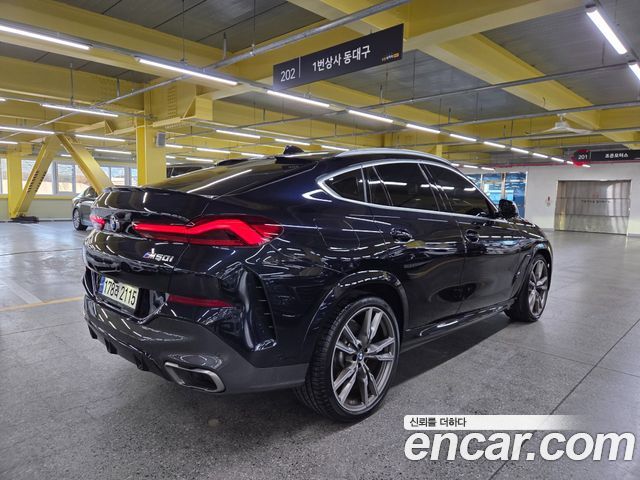 BMW X6 M50i — пробег 100 358 км — фото 2 из 5