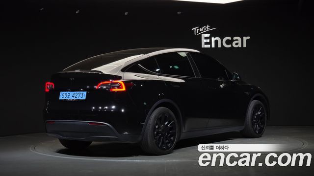Tesla Model Y RWD — пробег 56 610 км — фото 2 из 5