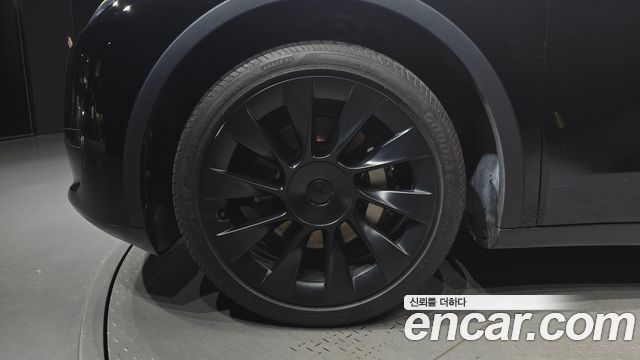 Tesla Model Y RWD — пробег 56 610 км — фото 5 из 5