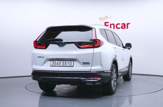 Honda CR-V 2.0 Hybrid Touring 4WD — пробег 85 182 км — фото 4 из 5