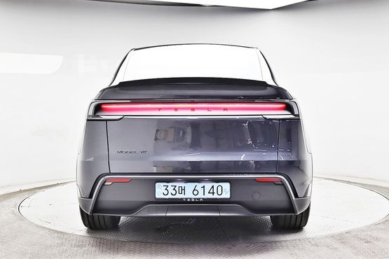 Tesla Model Y L Long Range AWD — пробег 1 865 км — фото 4 из 5