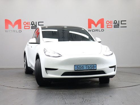 Tesla Model Y RWD — пробег 59 251 км — фото 2 из 5