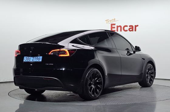 Tesla Model Y Long Range AWD — пробег 57 887 км — фото 2 из 5