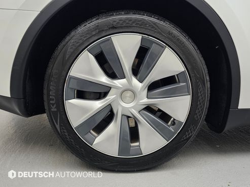 Tesla Model Y RWD — пробег 48 639 км — фото 5 из 5
