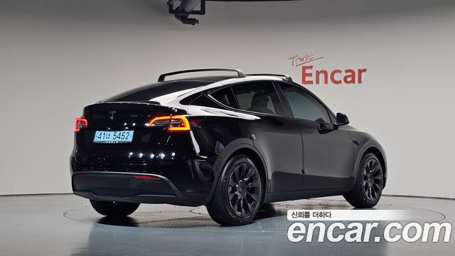 Tesla Model Y Standard Range RWD — пробег 50 991 км — фото 2 из 5
