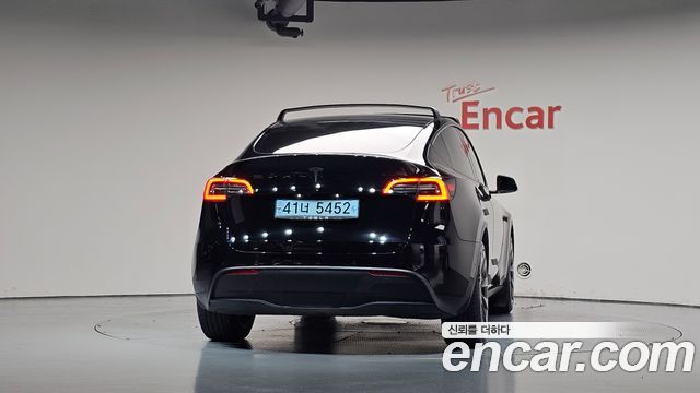 Tesla Model Y Standard Range RWD — пробег 50 991 км — фото 4 из 5