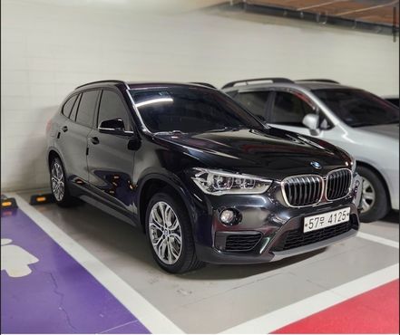 BMW X1 xDrive 18d Joy — пробег 64 877 км — фото 2 из 5